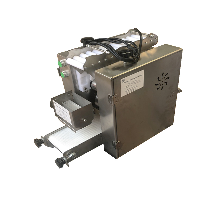 Table top dumpling skin wrapper forming machine